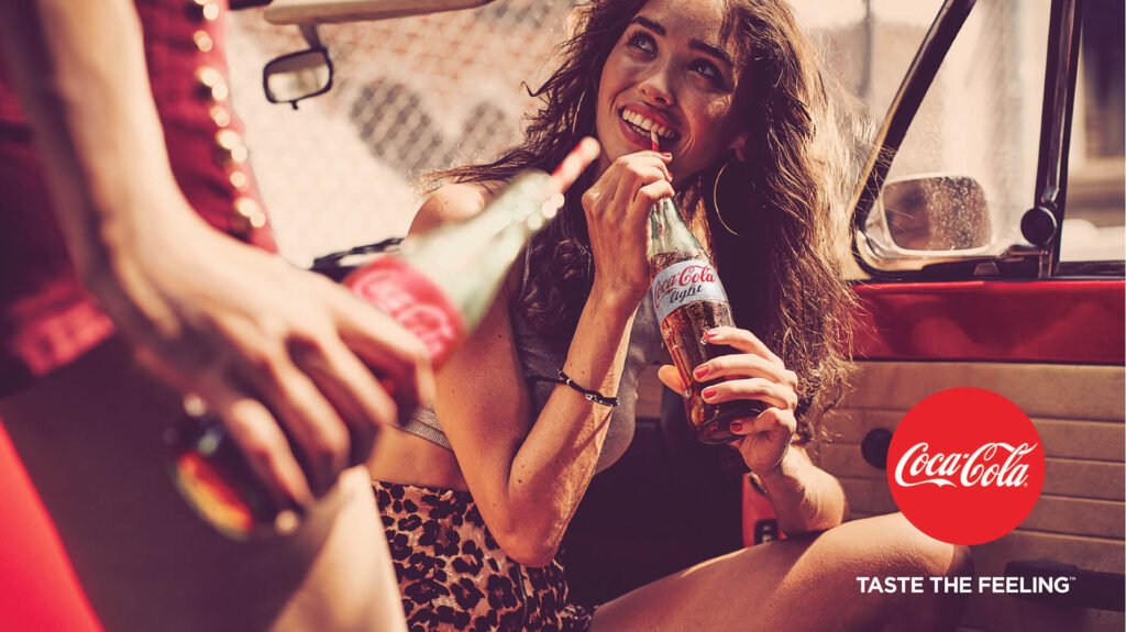 coca-cola brand positioning strategy through taste the feeling advert